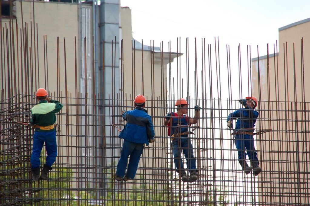 Contact steel workers, concrete, formwork, construction worker, construction, construction site, shell, metal struts, construction worker, construction worker, construction worker, construction worker, construction, construction, construction, construction, construction site, construction site, construction site, construction site, construction site